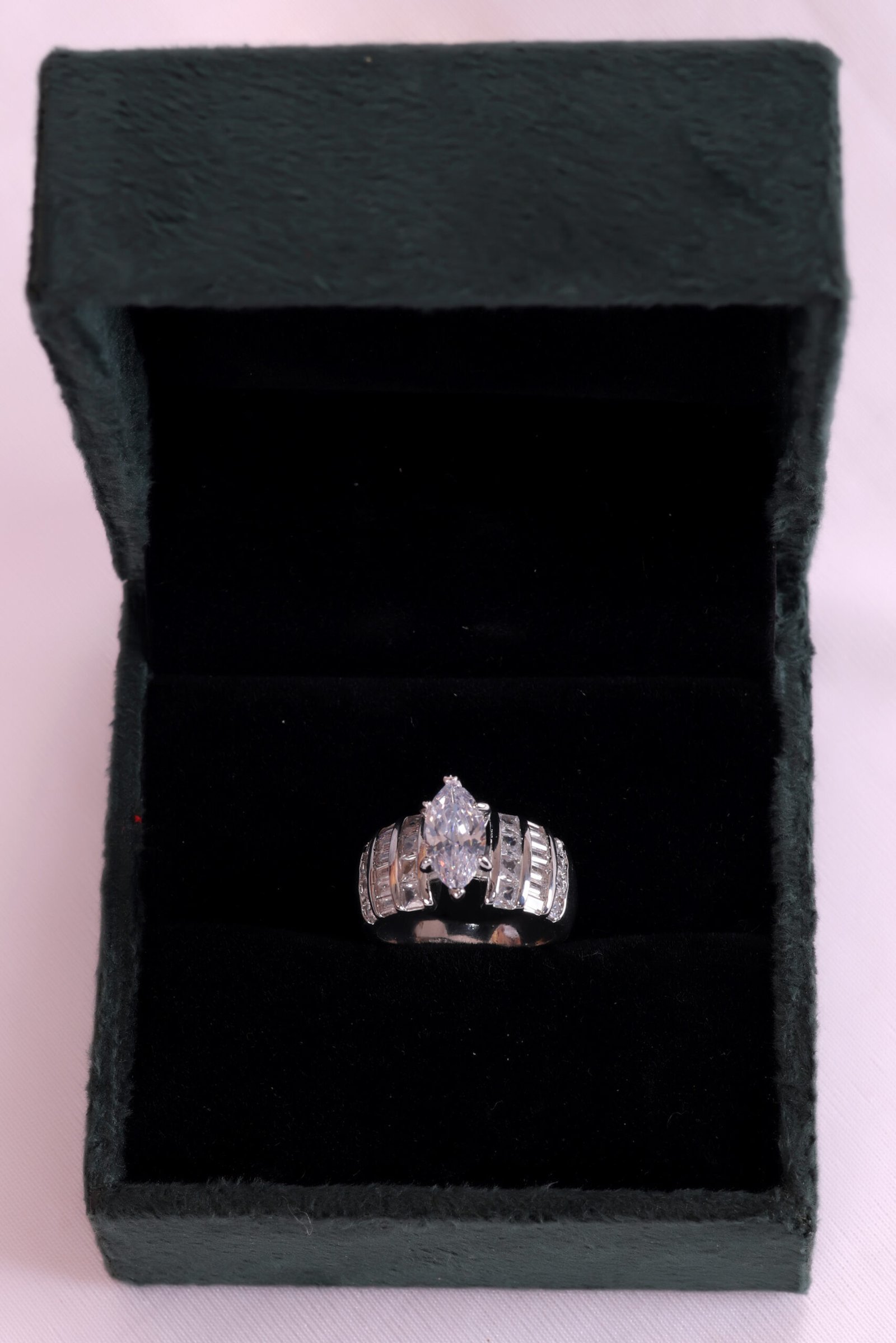 Elegant Marquise-Cut Diamond Ring with Channel-Set Accents - Image 2