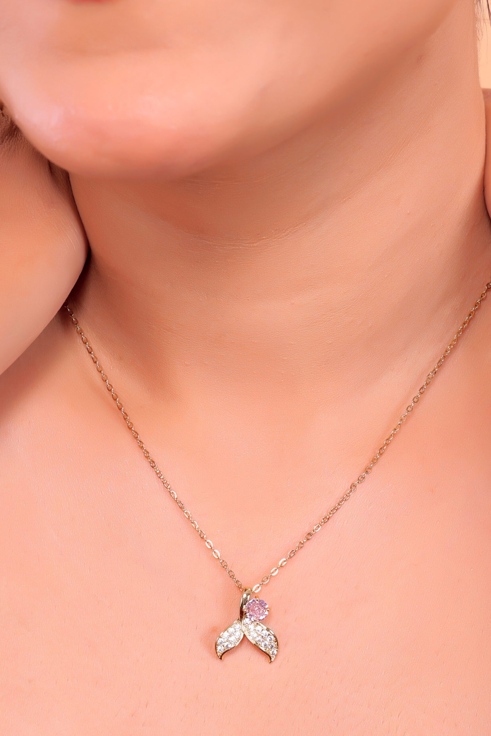 Elegant Gold Necklace with Pink and White Gemstone Pendant