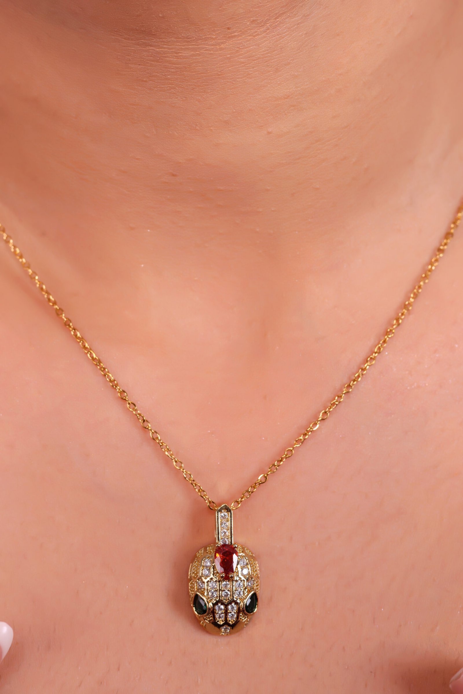 Luxurious Snake Pendant Necklace with Ruby & Emerald Accents – Symbol of Power & Elegance