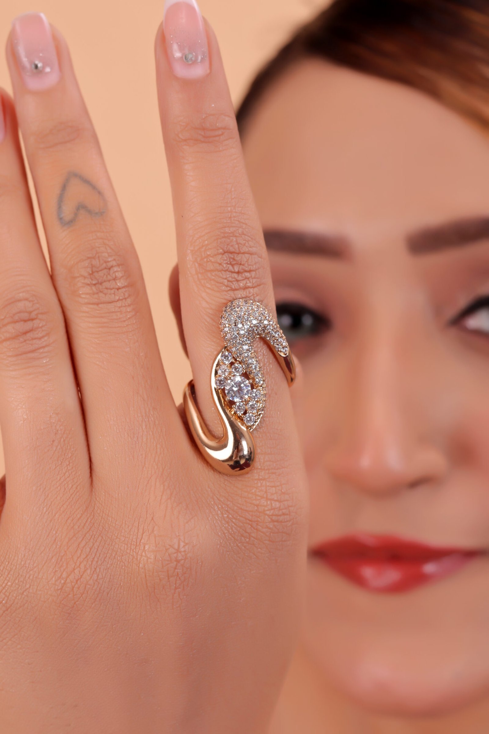 Exquisite Rose Gold Statement Ring with Sparkling Diamond Accents and Elegant Curved Design